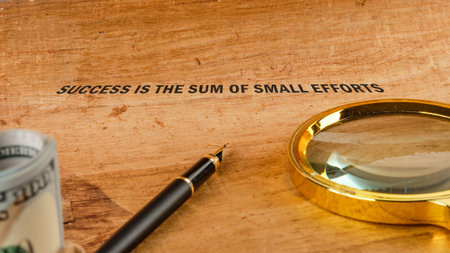 An inspiring message about consistent small efforts shaping success, presented on aged wood with...
