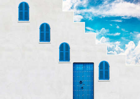 Architectural image of a blue door and window with stair walls with blue sky, windows and doors architecture conceptの写真素材