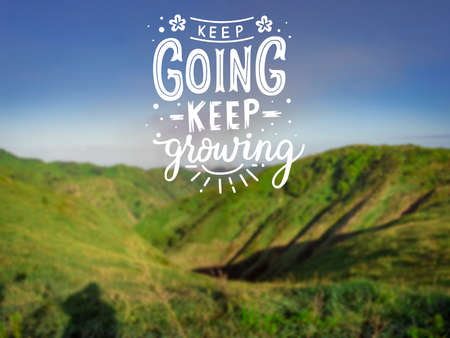 motivational phrases keep going keep growing, image of a hill with motivational messages keep going, keep growingの写真素材