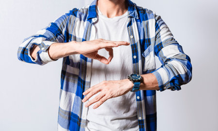 Person speaking in sign language isolated. Young man gesturing in sign language, People who speak in sign language. Manual gestures of people with hearing problemsの写真素材
