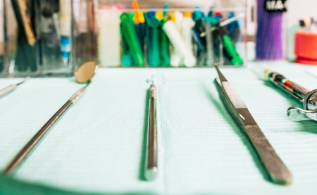 Stomatologist tools close-up on table. Set of dental tools on dentist's panel. Close up of dental tools on dentist's table, Dentist tools on the tableの写真素材