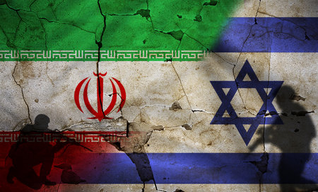 Israel vs Iran flag on cracked wall. Conflict between Iran and Israel concept. Political tension...
