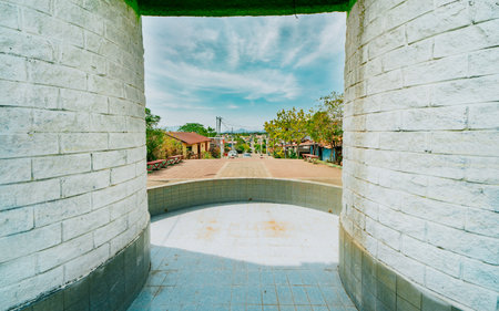 Street of Nagarote with a view of the Momotombo volcano, Nicaragua. Nagarote street with a view of the Momotombo volcano seen from the La concordia viewpointの写真素材
