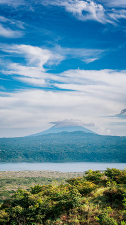Landscape of a volcano surrounded by green vegetation, Nicaraguaの写真素材
