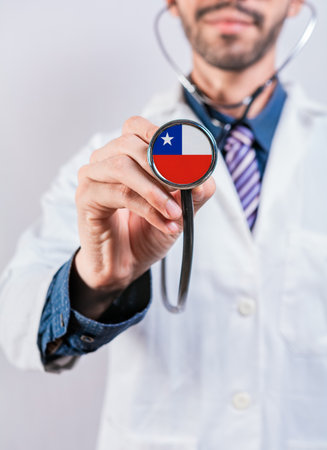 Chile health and medical insurance concept. Chile healthcare system, doctor holding stethoscopeの写真素材