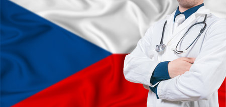 Czech Republic healthcare concept. Male doctor on Czech Republic flag. Doctor with crossed arms on Czech Republic flagの写真素材