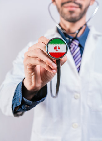 Iran health and medical insurance concept. Iran healthcare system, doctor holding stethoscopeの写真素材
