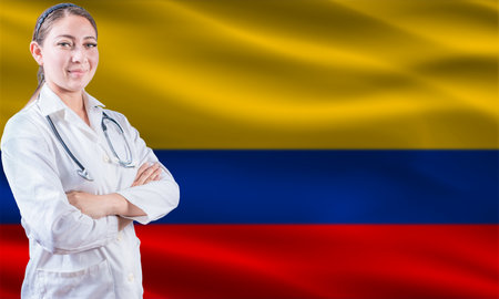 Female doctor on Colombia flag. Doctor with crossed arms on Colombia flag. Colombia health and care conceptの写真素材