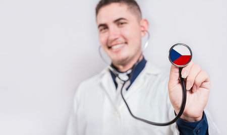 Doctor showing stethoscope with Czech Republic flag. Czech Republic national healthcare conceptの写真素材