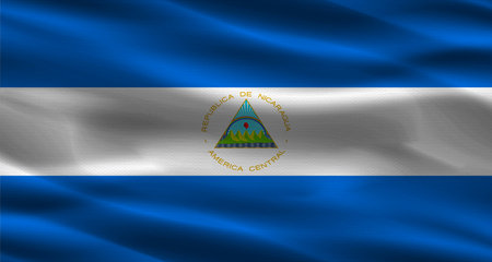 Nicaragua flag with fabric texture. Realistic flag of Nicaragua wavingの写真素材