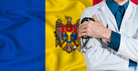 Doctor with stethoscope on Moldova flag. Doctor holding stethoscope on Moldova flagの写真素材