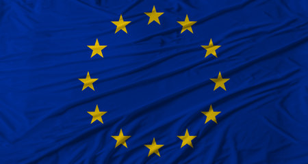Close up of European Union flag waving. Flag of European Union with cloth textureの写真素材