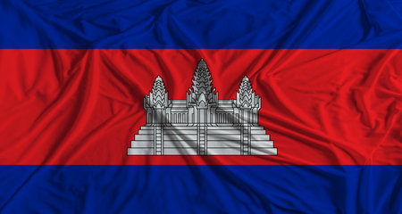Cambodian flag with fabric texture background. National flag of Cambodia with cloth textureの写真素材