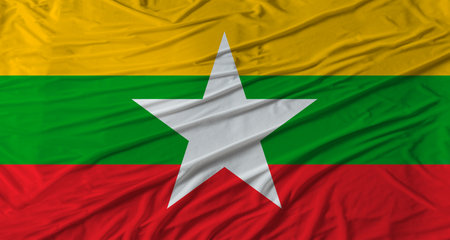 Close up of Myanmar flag waving. Flag of Myanmar with cloth textureの写真素材