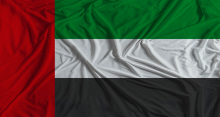 Emirati flag with fabric texture background. National Flag of United Arab Emirates with cloth...