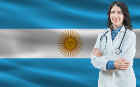 Argentinian medicine and healthcare concept. Doctor close up against Argentina flag backgroundの写真素材