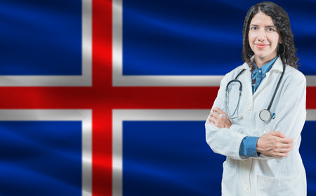 Icelandic medicine and healthcare concept. Doctor close up against Iceland flag backgroundの写真素材
