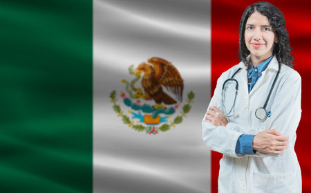 Mexican medicine and healthcare concept. Doctor close up against Mexico flag backgroundの写真素材
