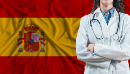 Medical professional on Spain flag. Healthcare and wellness in Spain, Conceptの写真素材
