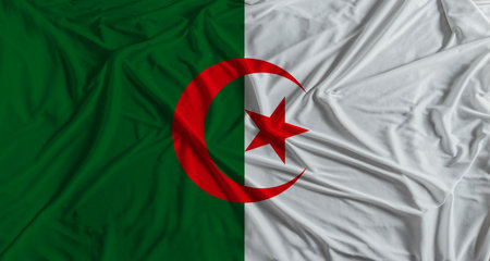 Algerian flag with fabric texture background. National flag of Algeria with cloth textureの写真素材