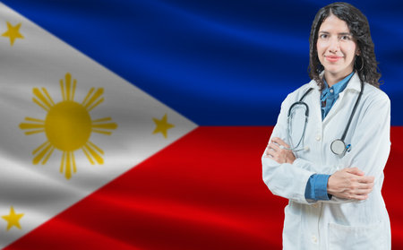 Filipino medicine and healthcare concept. Close up of doctor against Philippine flag backgroundの写真素材