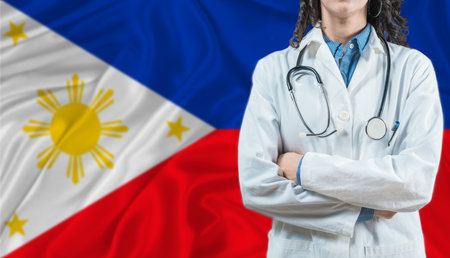 Medical professional on Philippine flag. Healthcare and wellness in the Philippines, Conceptの写真素材