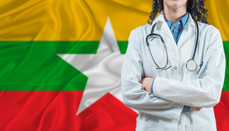 Medical professional on Myanmar flag. Healthcare and wellness in Myanmar, Conceptの写真素材