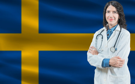 Swedish medicine and healthcare concept. Close up of doctor against Sweden flag backgroundの写真素材