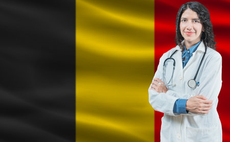 Belgian medicine and healthcare concept. Close up of doctor against Belgium flag backgroundの写真素材