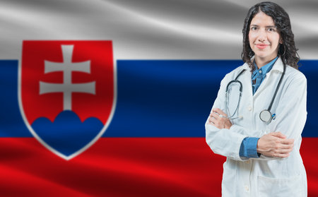 Slovak medicine and healthcare concept. Close up of doctor against Slovakia flag backgroundの写真素材