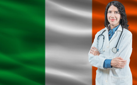 Irish medicine and healthcare concept. Close up of doctor against Ireland flag backgroundの写真素材