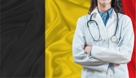 Medical professional on Belgium flag. Healthcare and wellness in Belgium, Conceptの写真素材