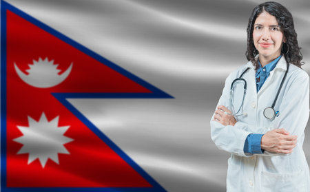 Nepali medicine and healthcare concept. Close up of doctor against Nepal flag backgroundの写真素材