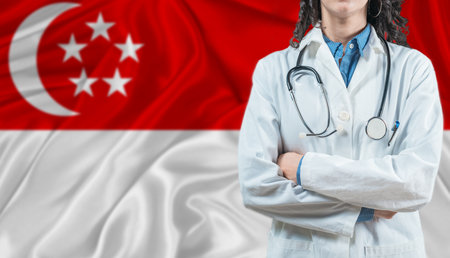Medical professional on Singapore flag. Healthcare and wellness in Singapore, Conceptの写真素材