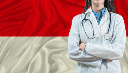 Medical professional on Indonesia flag. Healthcare and wellness in Indonesia, Conceptの写真素材