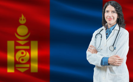 Mongolian medicine and healthcare concept. Close up of doctor against Mongolia flag backgroundの写真素材