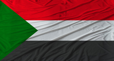 Sudanese flag waving Flag of Sudan with cloth textureの写真素材