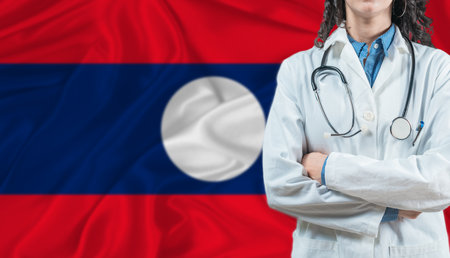 Medical professional on Laos flag. Healthcare and wellness in Laos, Conceptの写真素材