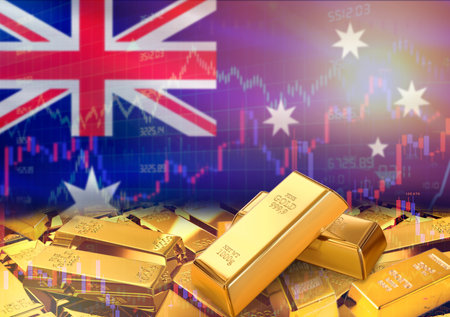 Gold bars on Australia flag in background. Gold bars stacked on Australian flag. Concept of Australia gold reservesの写真素材