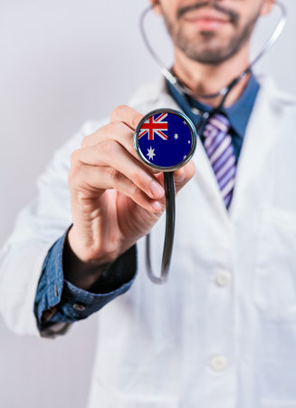 Australia health and medical insurance concept. Australia healthcare system, doctor holding stethoscopeの写真素材