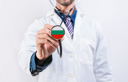 Bulgaria healthcare system, doctor holding stethoscope. Bulgaria health and medical insurance conceptの写真素材