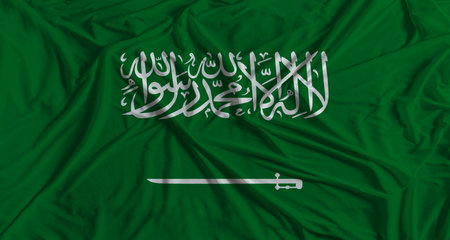 Saudi Arabian flag with fabric texture background. National flag of Saudi Arabiaの写真素材
