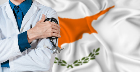 Doctor with stethoscope on Cyprus flag. Doctor holding stethoscope on Cyprus flagの写真素材