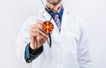 North Macedonia healthcare system, doctor holding stethoscope. North Macedonia health and medical insurance conceptの写真素材
