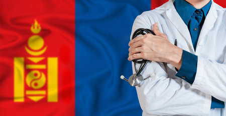 Doctor with stethoscope on Mongolia flag. Doctor holding stethoscope on Mongolia flagの写真素材
