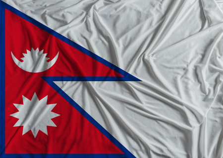 Nepal flag with fabric texture background. National flag of Nepal with cloth textureの写真素材