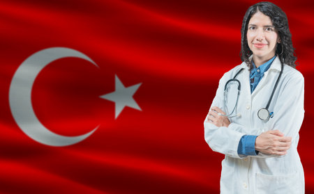 Turkish medicine and healthcare concept. Doctor close up against Turkey flag backgroundの写真素材