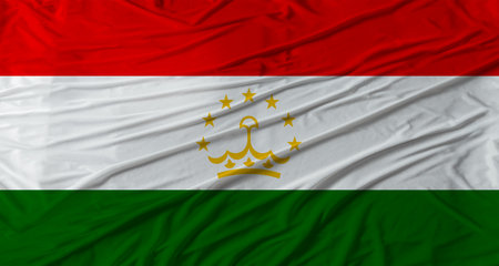 Close up of Tajikistan flag waving. Flag of Tajikistan with cloth textureの写真素材
