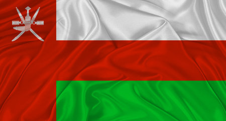 Flag of Oman with cloth texture. Close up of Oman flag wavingの写真素材