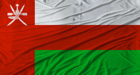 Close up of Oman flag waving. Flag of Oman with cloth textureの写真素材